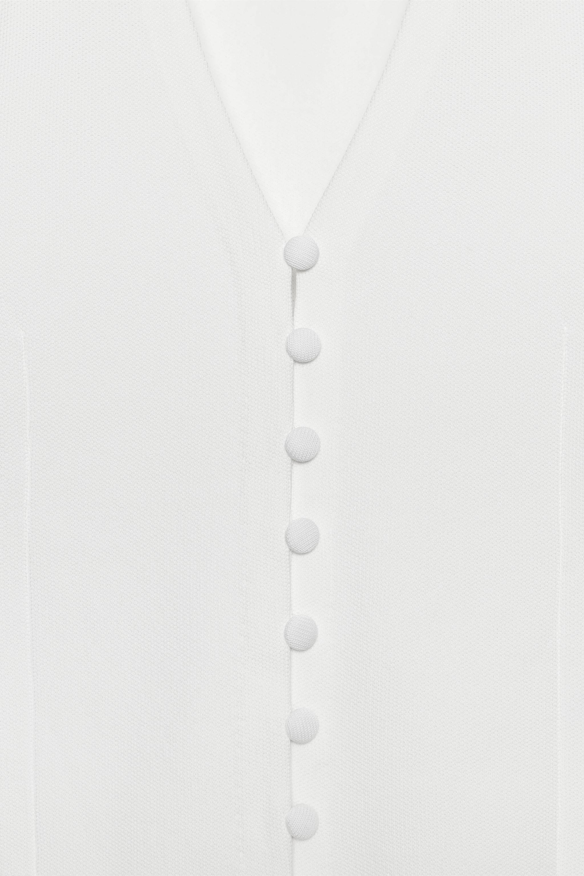 SHORT SLEEVE KNIT CARDIGAN